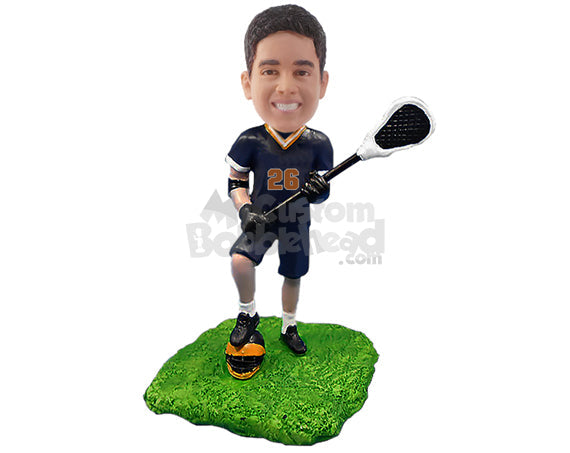 Male lacrosse player having a good time with his uniform on, stepping on his helmet Personalized Bobblehead Male lacrosse player having a good time with his uniform on, stepping on his helmet Personalized Bobblehead